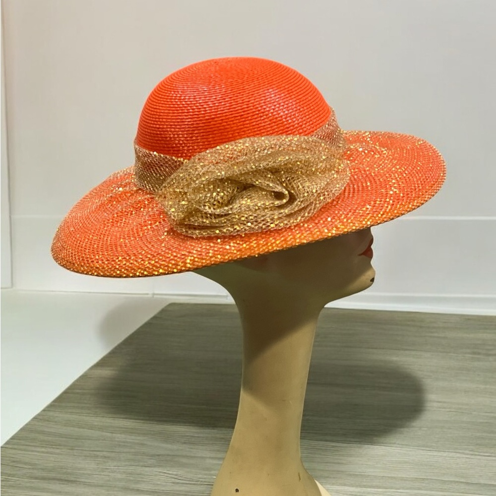 Deborah New York Orange Fancy Hat with glittering veils wrapped around hat.